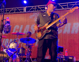 alt="Marketing Director, Ken Dusman, playing the bass on stage with the Brock Walker Band"