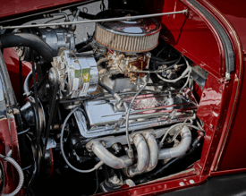 alt="Photo of an engine in a restored Ford Model A Sedan"