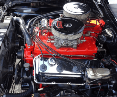 alt="Engine of a 1968 Plymouth Barracuda"