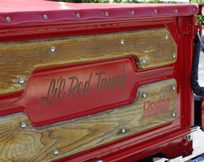alt="Tailgate of 79 Dodge D150 Lil Red Express"