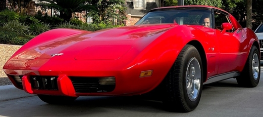 alt="Red Chevrolet Corvette"