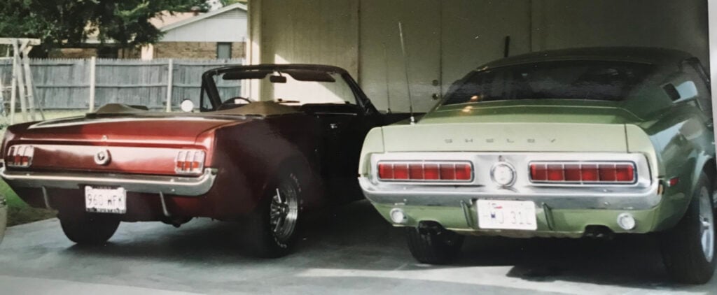 alt="Two Ford Mustangs side by side"